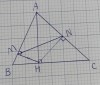 a) Xét tứ giác AMHN, có:<br /><br />∠AMH = 90° (M là hình chiếu của H trên AB) <br /><br />∠ANH = 90° (N là hình chiếu của H trên AC) <br /><br />=> ∠AMH + ∠ANH = 90° + 90° = 180°<br /><br />Mà: ∠AMH và ∠ANH là 2 góc đối diện<br /><br />Do đó: tứ giác AMHN nội tiếp đường tròn<br /><br />Nên: A, M, H, N cùng thuộc đường tròn<br /><br />b) Ta có:<br /><br />AH là đường kính của đường tròn ngoại tiếp tứ giác AMHN<br /><br />MN là dây cung là đường tròn ngoại tiếp tứ giác AMHN<br /><br />Do đó: AH > MN